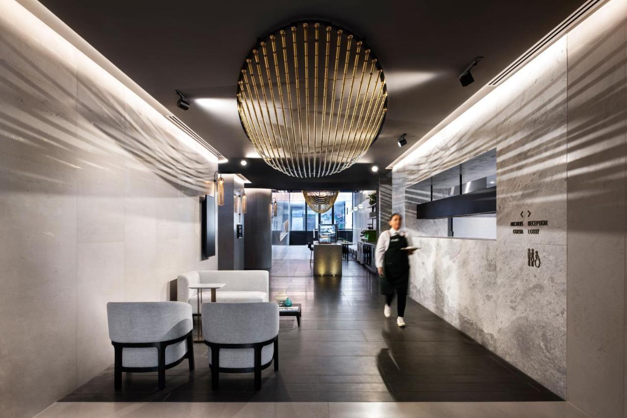 Melbourne Marriott Hotel Docklands Buitenkant foto The interior of the lounge